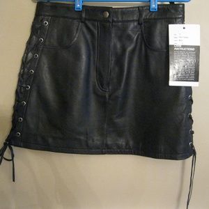 Leather Skirt Size 12  with Laced sides design.